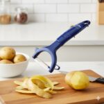 پوست کن کمانی دسته رنگی نیوهوم